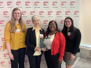 Eureka! presents Challenger staff with an award.